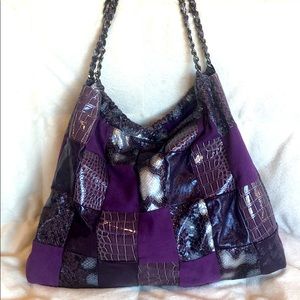 Sondra Robert’s purple handbag